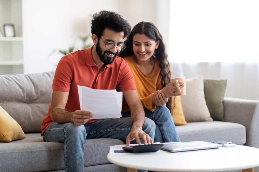 Happy couple analysing the best options for Superannuation Funds