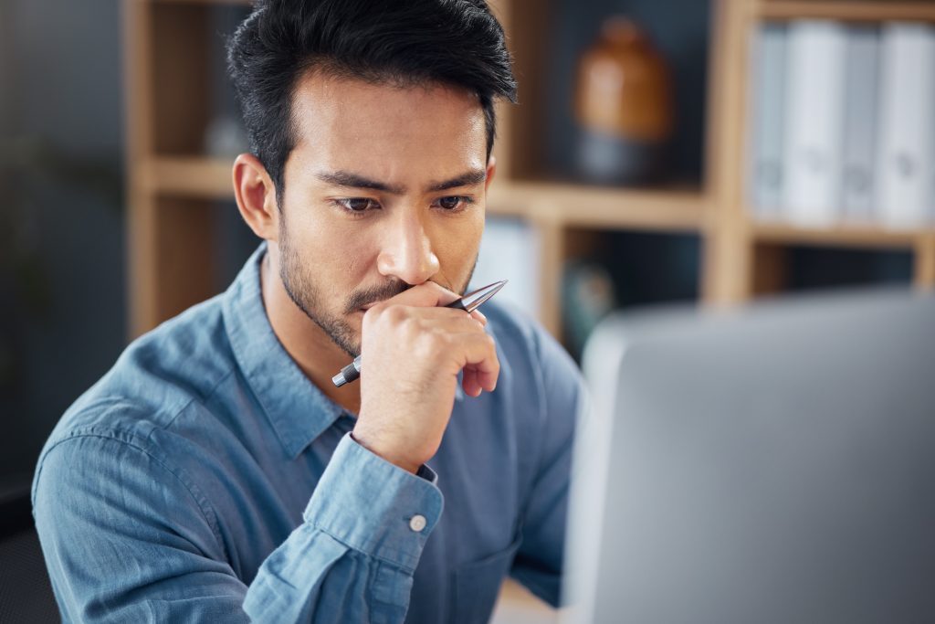 Man trying to decide whether to invest in ETFs or LICs